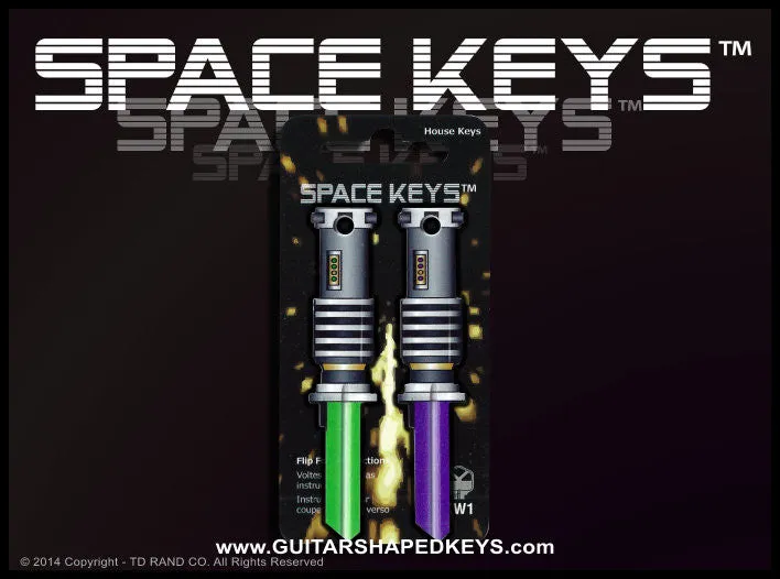 2 Green and Purple Light Saber Shaped Space Keys