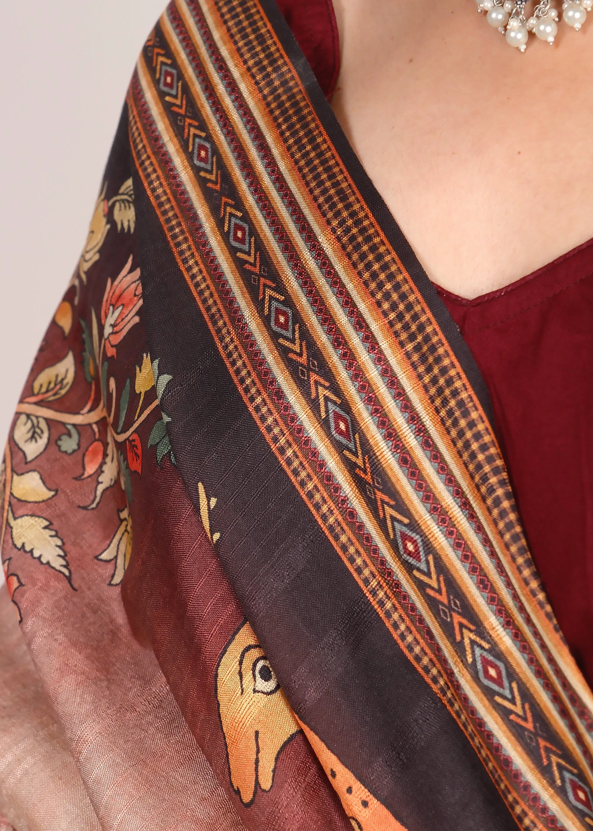 Exquisite Beige Silk Saree with Vibrant Animal Motifs