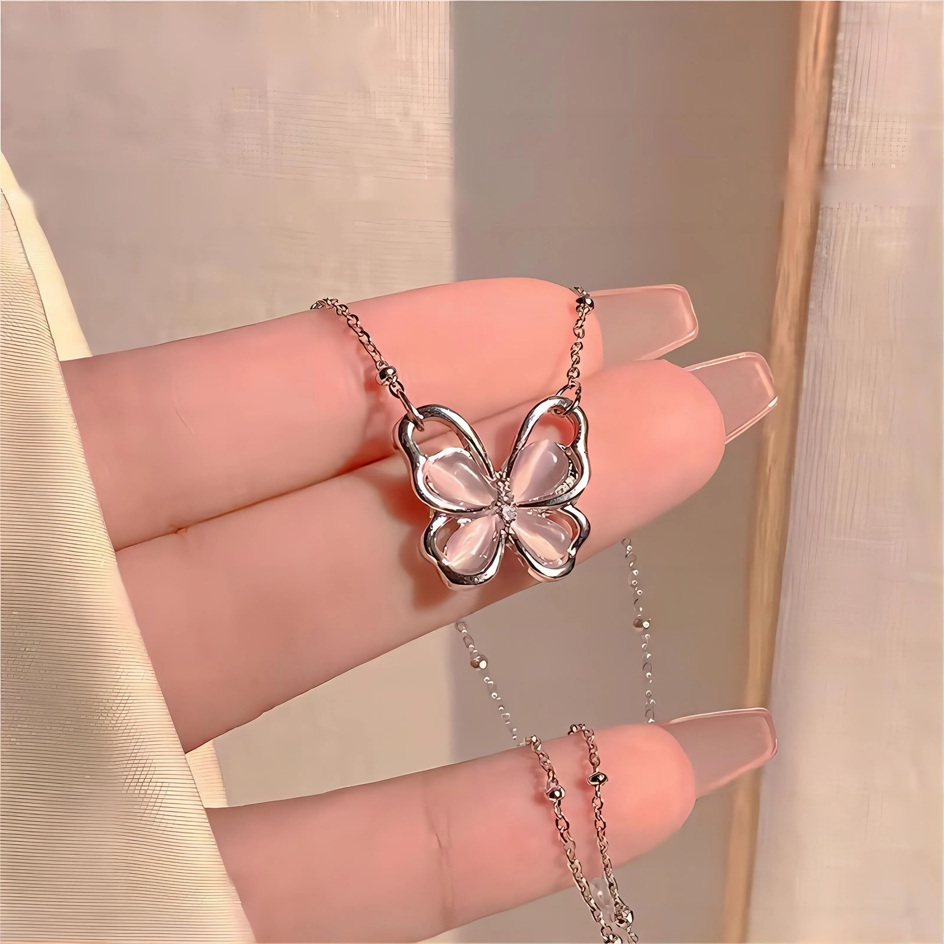 Exquisite Pink Cats Eye Stone Butterfly Necklace