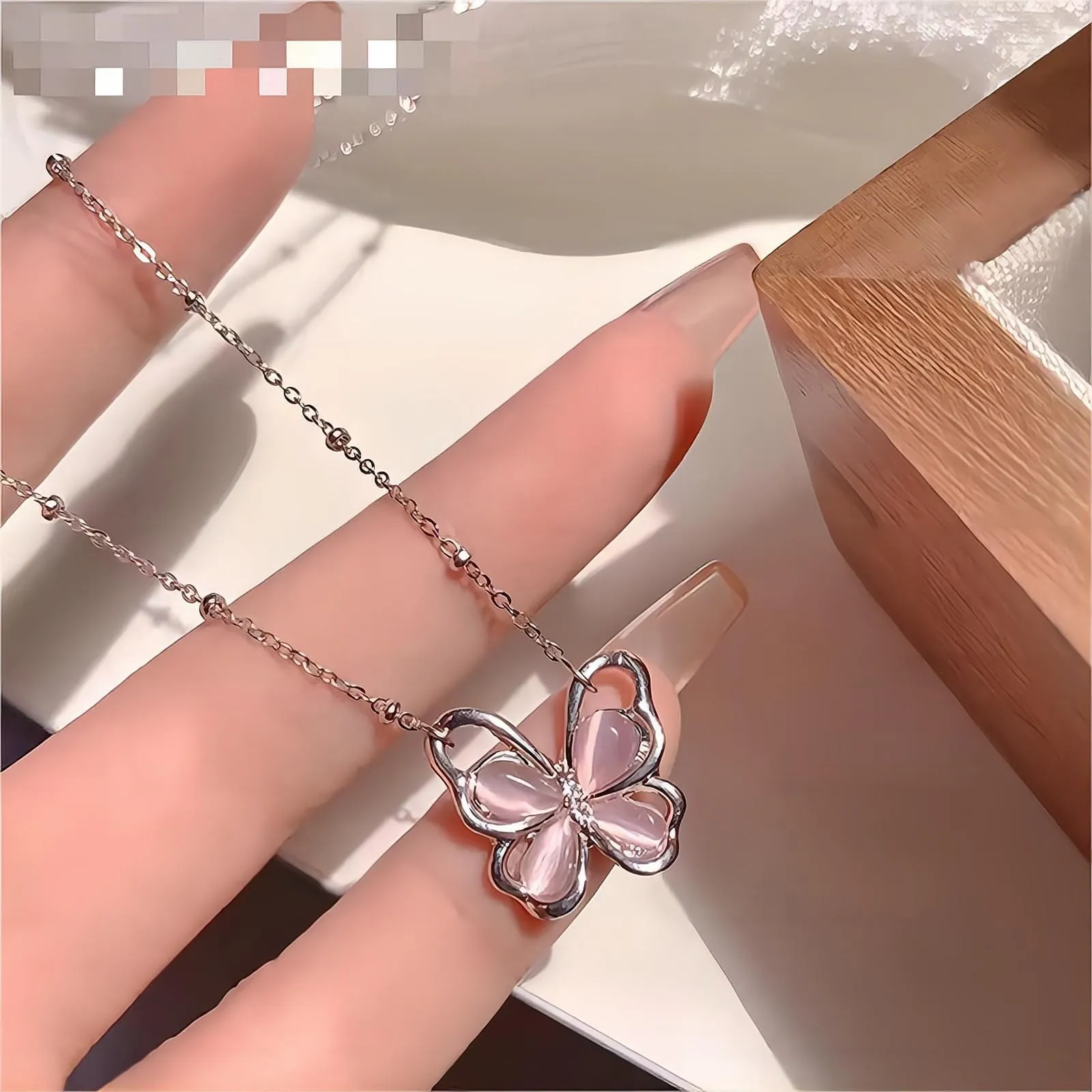 Exquisite Pink Cats Eye Stone Butterfly Necklace