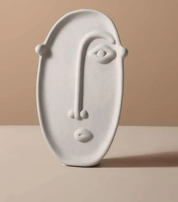 White oval face flower vase
